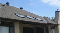Rancourt Roofing reroof with architectural shingles and skylights
